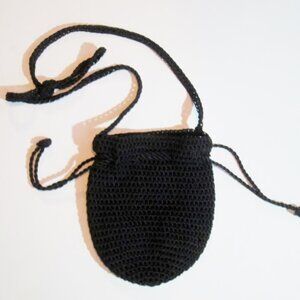 Black  woven clutch bag, made in Brazil.